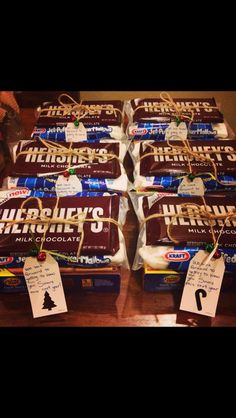 chocolate bars are wrapped in twine and tied with string for holiday gifts on display