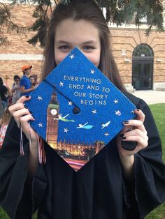 a girl in graduation gown holding up her cap with the words everything ends and so our story begins