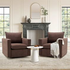 a living room with two brown chairs and a white table in front of a fireplace