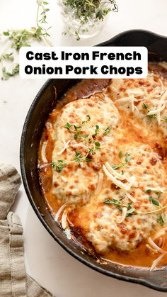 a cast iron french onion pork chops casserole in a skillet with parsley on top