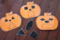 three pieces of paper cut out to look like pumpkins with faces and shapes on them