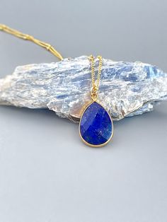 "Stunning Genuine Lapis Lazuli Gemstone Pendant necklace set in Vermeil (14k gold over sterling silver) on a delicate 14k gold filled chain. A stunning necklace. Pendant Size size: 20 x 14mm (approx 3/4\" tall\") Photos are zoomed to show detail. Please note measurements and see photos on model for scale Gemstones are nature's creations and may vary slightly in color and inclusions, but all are lovely and hand selected to match. We have more handmade Lapis Lazuli jewelry, hair accessories, and h Everyday Faceted Drop Jewelry, Everyday Sapphire Fine Jewelry, Handmade Teardrop Pendant Jewelry For Everyday, Dainty 14k Gold Filled Faceted Necklace, Elegant Sapphire Necklace For Everyday Wear, Everyday Gemstone Drop Jewelry, Everyday Sapphire Sterling Silver Jewelry, Minimalist Handmade Drop Necklaces, Dainty Faceted 14k Gold Filled Necklaces