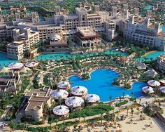 an aerial view of the resort and pool area