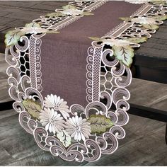 an image of a table runner with flowers on it