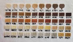 the cross stitch pattern shows different shades of brown