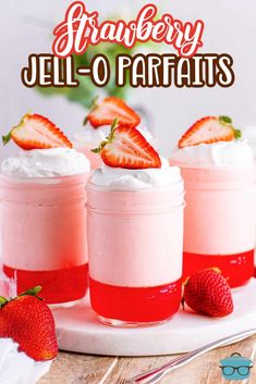 strawberry jell - o parfaits in jars with strawberries on the side