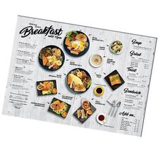 the breakfast menu is laid out on a table