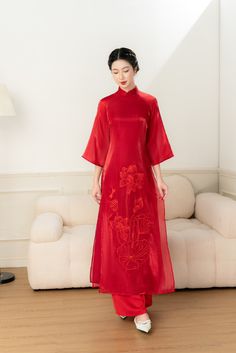 🌿 This set includes traditional Ao Dai, red pants. Style: Traditional Material: Very well made with high-quality double layers silk Collar: traditional collar Please provide bust-waist-and hip measurements when placing your order to ensure the best fit for you. 🌿 NOTE: * Recommend gentle washing * Please contact us for any inquiries about size. We don't have an exchange policy for the wrong size * It is safe for a washer and dryer in a "delicate" setting. * Actual Ao Dai colors may differ up t Red Fitted Cheongsam For Traditional Ceremonies, Festive Traditional Cheongsam With Short Sleeves, Festive Traditional Short Sleeve Cheongsam, Embroidered Ao Dai For Traditional Ceremonies, Traditional Long Sleeve Red Cheongsam, Traditional Red Embroidered Cheongsam, Red Cheongsam For Spring Festivals, Red Long Cheongsam For Spring, Red Cheongsam For Spring Festive Occasion