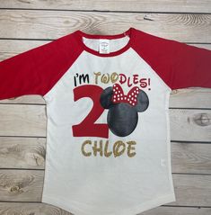 a red and white shirt that says i'm toddles 2 - 3 with a minnie mouse on it