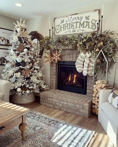 a living room with a christmas tree and fireplace