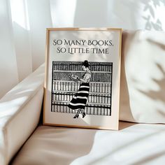 there is a sign that says so many books, so little time on the bed