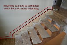 the stairs are made out of wood and have been painted white with red lettering on them