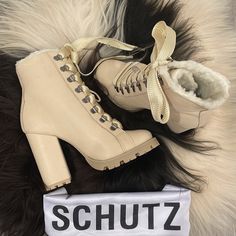 Schutz Zhara Nude(Eggshell) Faux Wool Interior Booties In Size 6! Perfect Addition To A Nude Color Bodysuit With A Blazer/Jacket And Dark/Black Colored Pants! Keep Your Feet Warm This Season! Comes With Schutz Box And Keeper Bag! See Item Details In Pics! Ask Any Questions A Reasonable Offer May Be Accepted No Low Balling Nwt Items Please! We Can Counter To An Agreed Upon Price If Necessary. Hit That Like Button For Private Deals And Shipping Discounts! Snag It When The Price Is Right! Bundle W/ Cream Heels With Reinforced Heel For Winter, Beige Block Heel For Winter, Winter Beige Block Heel Shoes, Chic Cream Heels For Winter, Cream Chic Heels For Winter, Beige Lace-up Heels For Winter, Casual Cream Heels For Winter, Cream Block Heel Shoes For Winter, Cream Block Heel Winter Heels