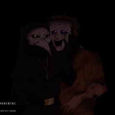 two creepy looking men hugging each other in the dark