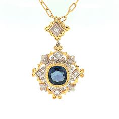 This pendant features a gem-quality blue sapphire and is a stunning example of timeless elegance! The custom-made design was envisioned specifically for this sapphire and displays the extraordinary craftsmanship that is a hallmark of our jewelry. Handmade in 18k white and yellow gold and accented with diamonds, the intricate detail, fine craftsmanship and skilled finishing details on this piece are remarkable! A timeless piece you will enjoy and cherish forever! 18k yellow gold chain included. 1 Exquisite Blue Jewelry With Single Cut Diamonds, Luxury Sapphire Jewelry With Single Cut Diamonds, Luxury Sapphire Pendant Necklace, Formal Blue Necklace With Rose Cut Diamonds, Luxury Blue Necklace With Single Cut Diamonds, Luxury Blue Necklaces With Single Cut Diamonds, Sapphire Pendant With Single Cut Diamonds, Blue Rose Cut Diamond Pendant Necklace, Blue Pendant Necklaces With Rose Cut Diamonds