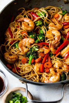 shrimp and vegetable stir fry in a skillet