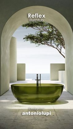 a green bathtub sitting in the middle of a room next to an archway with a tree growing out of it