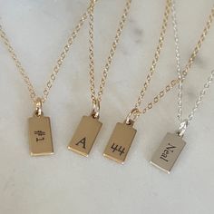 Personalized Mini Tag Necklace from our Memoirs Made Collection. A lovely display of your initials, or even a short word or phrase makes for a captivating look with our stylish tag pendant necklace. We will engrave your name or message in your choice of layouts on this 14k gold filled or 925 sterling silver shiny pendant, that is beautifully complemented by an elegant but understated matching chain.  Free Engraving Front and Back for a limited time!  For personalized order please keep an eye on 14k Gold Monogram Charm Necklace Gift, Gold Engraved Initial Necklace, 14k Gold Monogram Name Necklace For Everyday, Everyday Monogram 14k Gold Name Necklace, Everyday 14k Gold Monogram Name Necklace, 14k Gold Nameplate Initial Necklace For Anniversary, Rectangular Monogram Jewelry For Anniversary, Gold Nameplate Initial Necklace In 14k Gold, Gold Minimalist Name Necklace For Anniversary