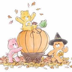 three teddy bears are sitting on top of a pumpkin and one bear is riding in a wagon