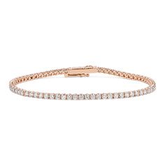 This stunning lab-grown diamond tennis bracelet offers beautiful sparkle  whether worn alone or stacked with other favorite bracelets. The diamonds are hand-matched for consistent beauty while the box clasp features a figure-eight safety latch for extra security. Crafted in charming 14-karat rose gold  it makes a special gift or a classic addition to your own jewelry collection. Gold Tennis Bracelet, 22 Carat Gold, Diamond Tennis Bracelet, Box Clasp, Tennis Bracelet Diamond, Tennis Bracelet, Special Gift, Lab Grown, Lab Grown Diamonds