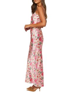 Get ready to turn heads in the Mirra Floral Maxi Dress! This playful suspender dress features adjustable spaghetti straps, a high waist, and a slim fit to accentuate your curves. Perfect for any occasion, this dress from Good Girl Things' Spring-Summer Collection will have you feeling confident and chic. Details Mirra Floral Maxi Dress in Pink Adjustable Spaghetti Straps Suspender Dress High Waist Slim Fit Good Girl Things Spring-Summer Collection Fitted Maxi Slip Dress For Casual Wear, Fitted Maxi Length Slip Dress For Casual Wear, Pink Strapless Dress With Built-in Bra, Fitted Bodice Lined Slip Dress, Summer Prom Slip Dress With Delicate Straps, Flirty Fitted Halter Neck Slip Dress, Prom Dress With Delicate Straps, Fitted Maxi Dress With Spaghetti Straps, Summer Satin Maxi Dress With Straight Neckline