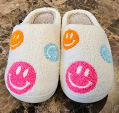 Smiley Face Slippers Stay cozy and cheerful with our Smiley Face Slippers. With their adorable smiley face design, you'll have a smile on your face every time you slip them on. Perfect for lounging and keeping your feet warm, these slippers are a must-have for any comfortable night in. 📏 These slippers run on the small side, so be sure to size up if you're in between sizes. For example: Im normally an 8.5 in sneakers so I prefer the 9-10. Fits perfectly! Preppy Smile Slippers, Preppy Slippers, Smiley Slippers, Smiley Face Slippers, Blue And Magenta, Girly Christmas Gifts, Smiley Face Design, Sneakers Slippers, Preppy Shoes