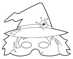 a mask with a witches hat on it and a spider crawling out of the top