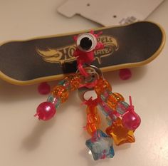 a skateboard and some toys on a table