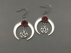 ❤︎ Silver Pentacle Earrings - Pentagram, Witch, Pagan, Grunge, Wicca, Witchcraft, Goth, Dark Mori, Goth, Boho, Halloween, Alternative, Symbol, Edgy There is a little color differ between the items and pictures due to different monitor. -Thank you for choosing us. When placing an order, please write your phone number, this is required by the transport company. Thank you. ❤︎ Click here to visit my store ❤︎ Dark Beauty: https://www.etsy.com/shop/DarkBeauty8?ref=seller-platform-mcnav Silver Earrings For Halloween Festival, Handmade Bohemian Costume Jewelry, Symbolic Handmade Jewelry For Halloween, Handmade Symbolic Jewelry For Halloween, Pentacle Earrings, Boho Halloween, Dark Mori, Wicca Witchcraft, Ear Rings