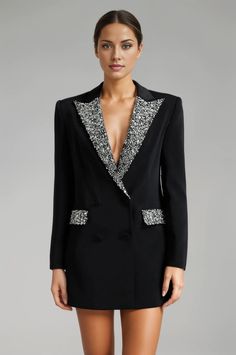 Elevate your wardrobe with the Rezi Rhinestone Blazer Dress. This black long blazer boasts a double-breasted design, complete with rhinestone-covered pockets and lapels. Versatile and luxurious, wear it as a dress or as a statement blazer. Add a touch of sparkle to any occasion. Elasticity: Non Stretch Material: Polyester, Cotton Closure Type: Double Breasted Care: Dry Clean Rhinestone Blazer, Statement Blazer, Shoes For Leggings, Long Blazer, Mens Eyewear, Black Mini Dress, Eyewear Womens, Notched Collar, Jean Leggings