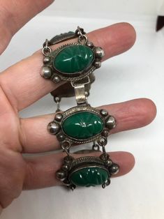 Unique Carved Bracelet Jewelry, Silver Carved Jade Jewelry, Unique Jade Bracelet Jewelry, Carved Silver Jade Jewelry, Vintage Green Bracelet With Natural Stones, Antique Engraved Jade Jewelry, Vintage Green Bracelets With Natural Stones, Antique Green Handmade Bracelet, Handmade Antique Green Bracelet