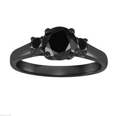 "HANDCRAFTED IN THE USA HERE IS HANDMADE BEAUTIFUL THREE STONE ENGAGEMENT RING 14 KARAT BLACK GOLD VINTAGE STYLE BLACK POLISH RING AVAILABLE WHITE OR ROSE OR YELLOW GOLD TOO ASK ME PLEASE CENTER BLACK DIAMOND !! 1.04ct !! VERY DEEP BLACK COLOR & CLEAN CENTER DIAMOND CENTER SHAPE- ROUND CUT- VERY GOOD COLOR- BLACK CLARITY- AAA CARAT- 1.04ct MEASUREMENT- 6.30mm 2 SIDE 2 BLACK DIAMONDS AAA 0.28ct!! TOTAL 1.32 CARAT RING SIZE IS 6 FREE SIZING AVAILABLE !! RETAIL PRICE IS OVER $4,500.00 COMES WITH $3 Three Stone Engagement Rings Vintage, Batman Wedding Rings, Engagement Ring Three Stone, Gothic Engagement Ring, Black Diamond Engagement Ring, Ring Three Stone, Black Diamond Engagement, Three Stone Engagement Ring, Engagement Ring Vintage