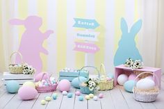 an easter scene with pastel colored eggs and baskets