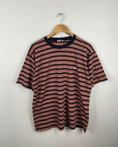 *ITEM DETAILS:Vintage 80s Hangten Stripe Border Stripe 1980s Hangten Medium  Surf Iconic Surfing Surfboard Stripe Tshirt Size M  👇🏻 Please be aware that all vintage items will usually show a few signs of wear or fading due to age, but anything visible such as stains or holes, and serious flaws have been photographed.For any further information on this item please contact us and we will be happy to help. *SIZE: LARGE  * ACTUAL SIZE MEASUREMENT: 👇🏻 *PIT TO PIT(WIDTH):24"INCHES *LENGTH(FROM SHOULDER): 27"INCHES    *ALL MEASUREMENTS ARE TAKEN WITH THE GARMENT FLAT ON THE GROUND *VIEW FULL SHOP HERE: *SHIPPING: (WITH ONLINE TRACKING NUMBER ) *DHL EXPRESS SHIPPING:4-6 BUSINESS DAYS *Don't Worry About Customs Tax or Fees. I usually Declare As 'Gifts' And Low Value  *PAYMENT (ACCEPT "PAYPAL" O Striped Tshirt Men, 80s Tshirts, Ballet Boys, 80s Men, Mens Stripes, Fashion Inspiration Design, Kpop Fashion Outfits, Dream Clothes, Mens Graphic Tee