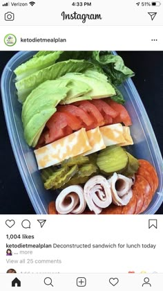 a plastic container filled with lots of different types of food on top of each other