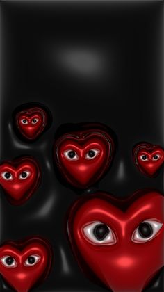 some red hearts with eyes in the middle