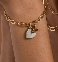 The small heart charm is engravable to showcase your favorite friends and loved ones. You have a heart of gold and now you’ve found the perfect pair. 
See here for additional heart charms. Find here RELLERY's best-selling bar bracelet. Cheap Gold Charm Bracelets, Luxury Handmade Silver Charm Bracelet, Affordable Gold Nameplate Charm Bracelet, Luxury Logo Charm Bracelet For Gift, Cheap Adjustable Nameplate Charm Bracelet, Luxury Classic Gold Charm Bracelet, Elegant Bracelet For Mother's Day, Gold Designer Necklace, Charm Bracelet Ideas