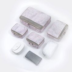 The Cloverland Packing Cube collection by Traveler's Choice is a 5-piece set designed to fit perfectly in your luggage. These cubes allow you to easily organize and maximize your packing space, featuring a mesh screen for clear visibility of contents. White Rectangular Travel Organizers, Rectangular White Travel Organizers, Travel Security, Marble Pink, Spinner Luggage Sets, Luggage Shop, Itzy Ritzy, Packing Cubes, Mesh Screen