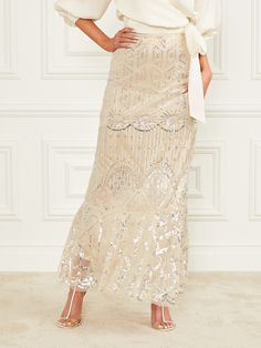 Glamorous Embellished Long Skirt, Glamorous Long Embellished Skirt, Embellished Long Evening Skirt, Elegant Embellished Long Skirt, Glamorous Embellished Floor-length Skirt, Embellished Fitted Long Skirt, Embellished Maxi Skirt For Evening, Embellished Long Maxi Skirt For Evening, Elegant Sequined Midi Skirt