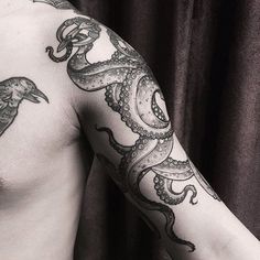 a man with an octopus tattoo on his arm