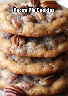 pecan pie cookies stacked on top of each other with pecans in the middle