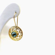 14K Solid Gold Swiss Blue Topaz Round Lacey Earrings 14K Gold Drop Earrings Special Gold Gift Boxed Great Gift for Mom, Daughter Bridal Gift Great Gift for Mom, Daughter, Bridal Gift is very valuable jewelry. It comes Gift Boxed and makes a Great Gift for Mom, Grandma, Daughter, or to a new Bride. It measures approximately 1.2 Inches Long X 08 Inch wide. The Earrings weight approximately 4.74 Gr. Pair. The gemstones are 6 mm round faceted Swiss Blue Topaz and African Ametyst. Each approximately Gold Gift Boxes, Blue Topaz Earrings, Great Gifts For Mom, Bridal Gift, Gold Gift, Topaz Earrings, Swiss Blue Topaz, Mom Daughter, Gold Drop Earrings