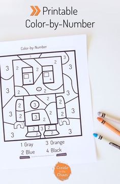 a printable color by number coloring page with crayons