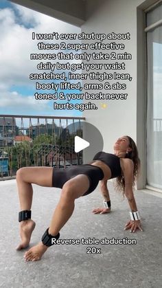 a woman is doing an exercise on the floor with her legs spread out in front of her