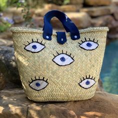 Eyes on Me Embroidered Bag - Bootsologie Evil Eye Hand, Mexican Traditions, Eyes On Me, Stylish Tote Bag, Sand Bag, Evil Eyes, Woven Tote Bag, Straw Bags, Embroidered Bag