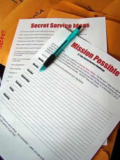 several mail envelopes and a pen sitting on top of each other with the words mission possible written on them