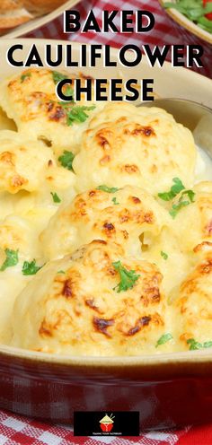 baked cauliflower cheese in a casserole dish on a red and white checkered tablecloth