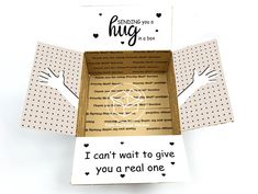 the inside of a cardboard box that says, sending a hug from a safe distance