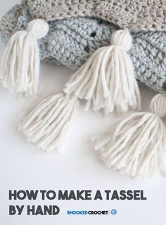 a crocheted bag with tassels on it and the words how to make a tassel by hand