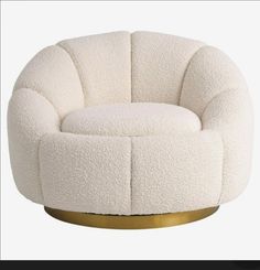 a white chair with a gold base on top of it's headrests